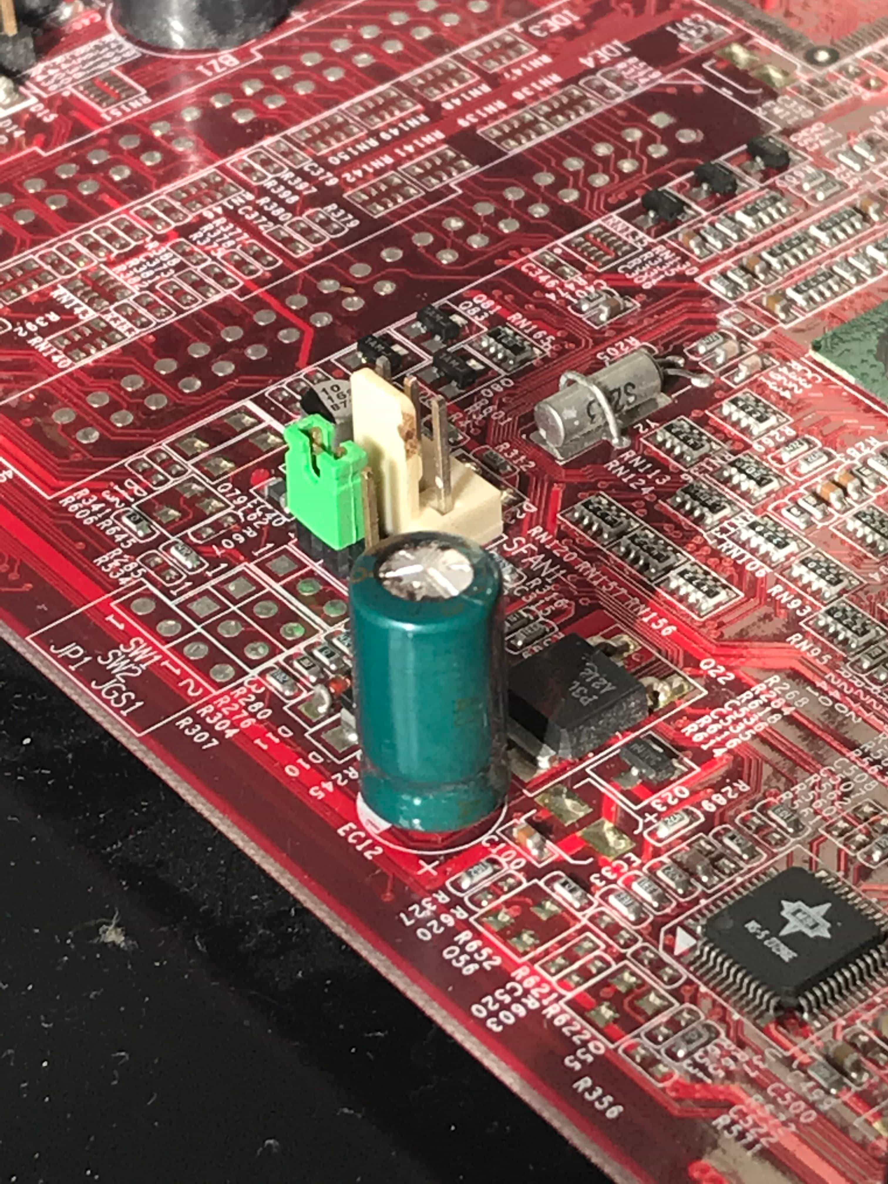 The odd tired-looking capacitor